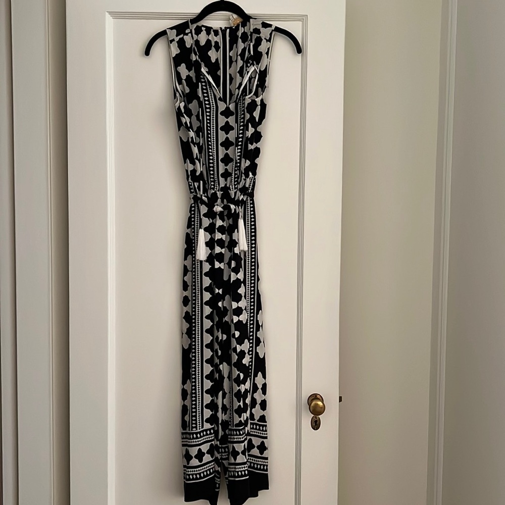 Kate Spade silk black and white sleeveless romper with tassel ties at neck